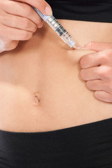 insulin shot by single use syringe pen with with dose of humalo