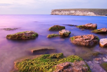 stones in a evening sea