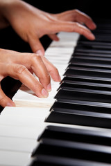 Fototapeta premium Playing piano