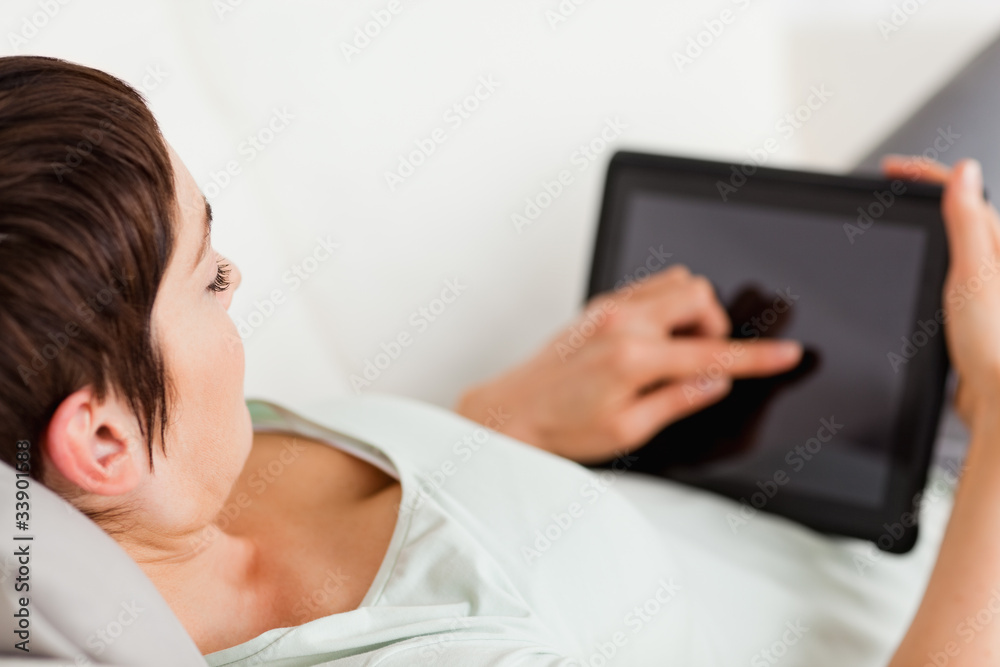 Poster woman using a tablet computer