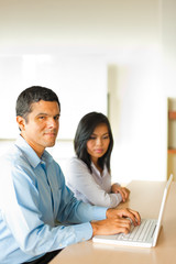 Obraz premium Hispanic Male Asian Female Business People