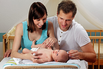 young couple with 7 week old baby