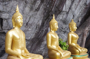 Three buddha at the cliff