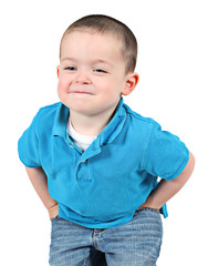 Cute little boy posing for camera on white background