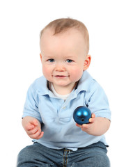 Fototapeta na wymiar Cute Baby Boy posing for camera on white background