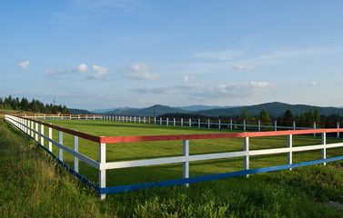 fence and farm pasture