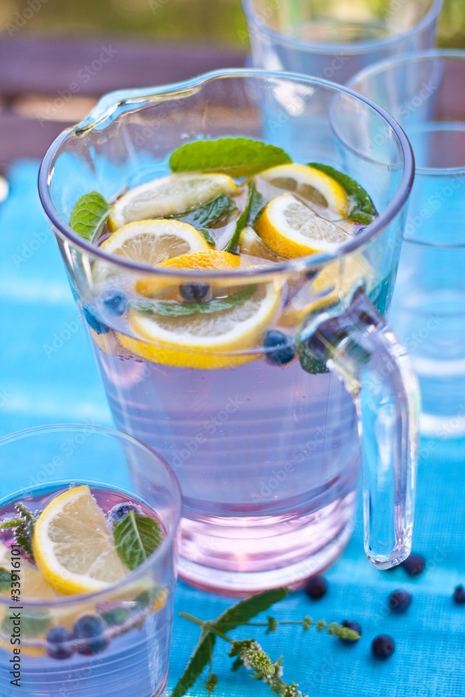 Wall mural drink with lemon, berries and mint