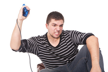 furious man with a joystick for game console