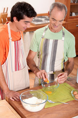 Men baking together