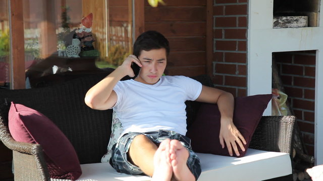young boy using a phone, shoot Canon 5D MarkII