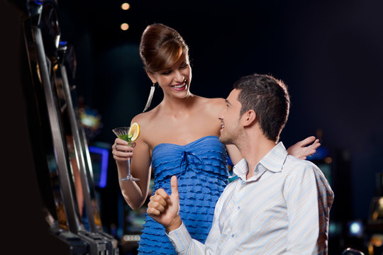 young pretty couple in a casino