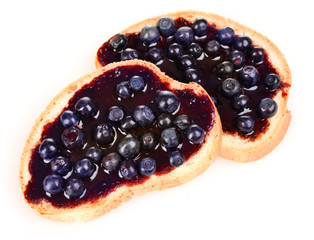 delicious toast with jam and blueberries isolated on white