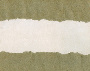 Torn grainy paper