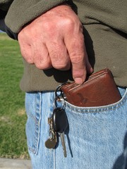Man taking wallet from jeans pocket  1
