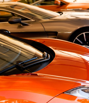 Fototapeta orange bronze sports cars