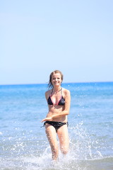 Woman running in the sea