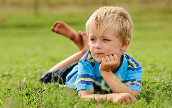 Cute Child Relaxing Outdoors