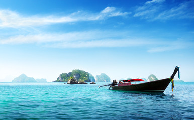 Fototapeta na wymiar boat and islands in andaman sea Thailand