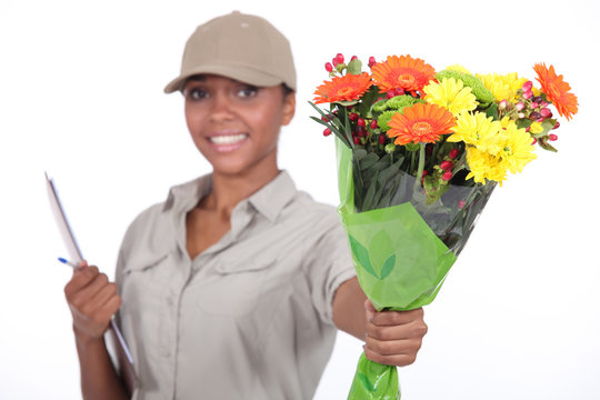Delivery Woman Giving Flowers
