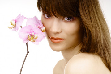 Naklejka premium woman with an orchid