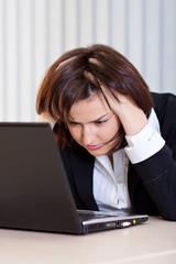 Beautiful business woman thinking