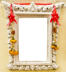 Thai style tomb with dry wreath