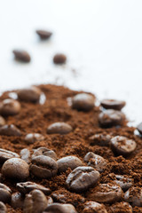 Close up image of coffee beans and ground coffee