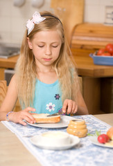 girl eating breakfast
