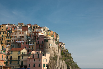 Fototapeta na wymiar Manarola homes on hillside. Cinque terre Italy.