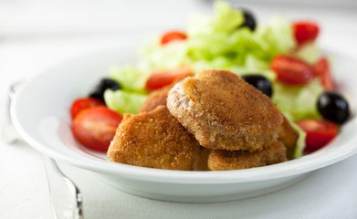 Meatballs with vegetable salad