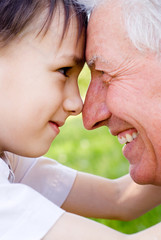 Fototapeta premium grandson with grandfather
