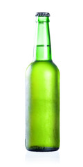 Cold chilled beer in green bottle with condensate isolated on a