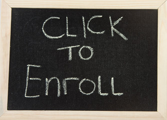 Obraz premium Board with 'click to enroll'