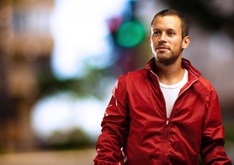 man with red jacket