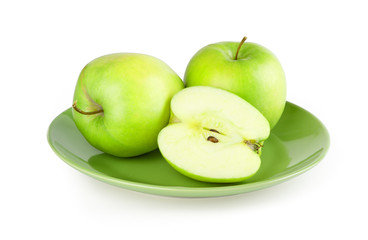 fresh green apple on a plate