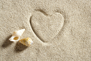 Fototapeta na wymiar beach white sand heart shape print summer vacation