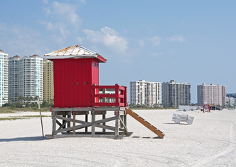 Red lifeguard stand on the beach