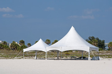 White ceremonial tent at the beach