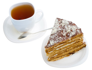 piece of honey cake and tea cup