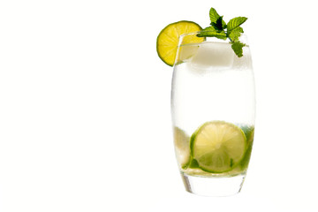Delicious cold cocktail, fruit and mint ice.
