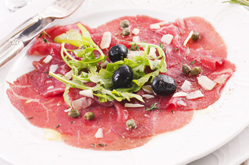 Obraz premium Carpaccio mit Rucola und Parmesan