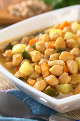 Vegetarian chickpea soup with carrots, potatoes, onions