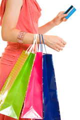 Girl with shopping on white background.
