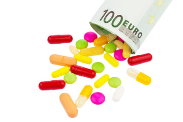 Tabletten und 100 Euroschein