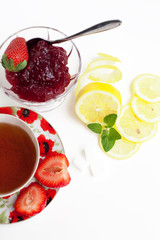 cup of tea, jam and lemon