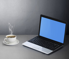 Fototapeta premium Laptop with coffee