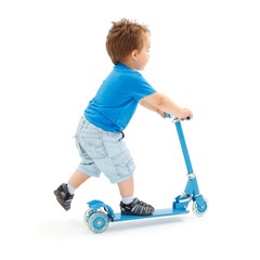 Little boy going with scooter © SzF Ilka Erika