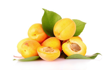 apricots with leaves isolated on white
