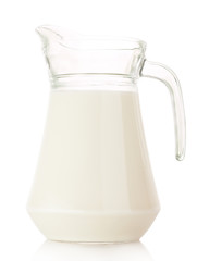 Pitcher with milk isolated on white