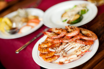 plate with grilled prawns and crab